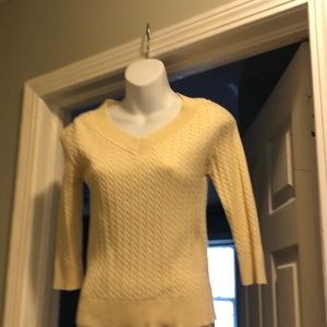 Yellow V-neck sweater